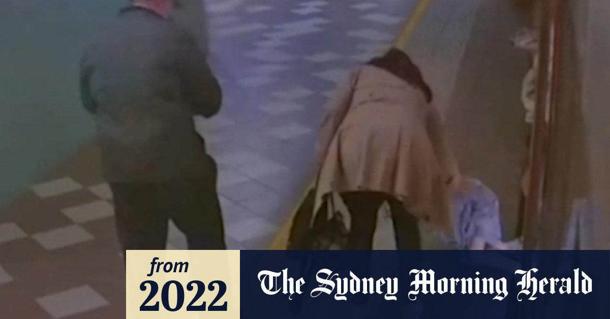 Video Woman falls headfirst through gap between train and platform as